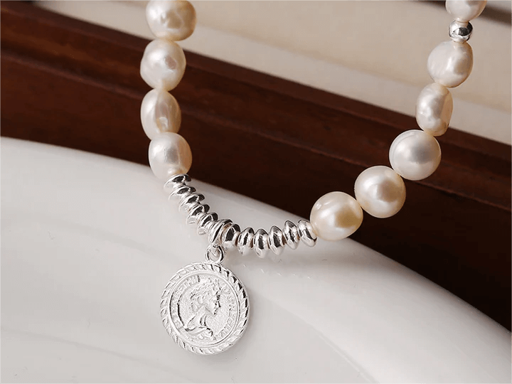 Deciphering the Enigmatic Allure of the Pearl Cross Necklace