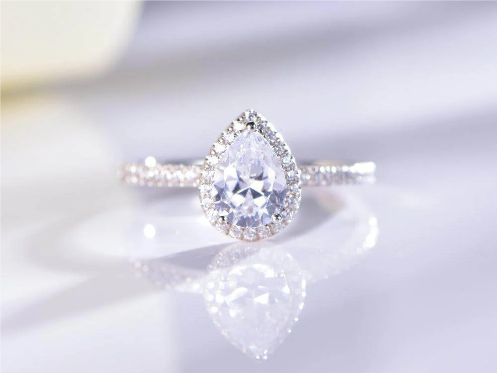 Unlock the Allure of Unique Pear Shaped Engagement Rings with Matching Wedding Bands